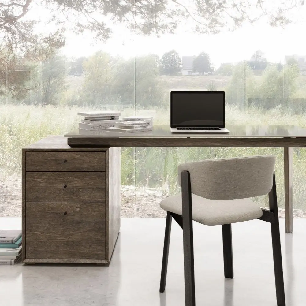 Modern charcoal-stained desk with matte black top and integrated three-drawer pedestal.