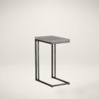 Modern white C-shaped end table with a thin metal base in a bronze finish and a sleek white top.