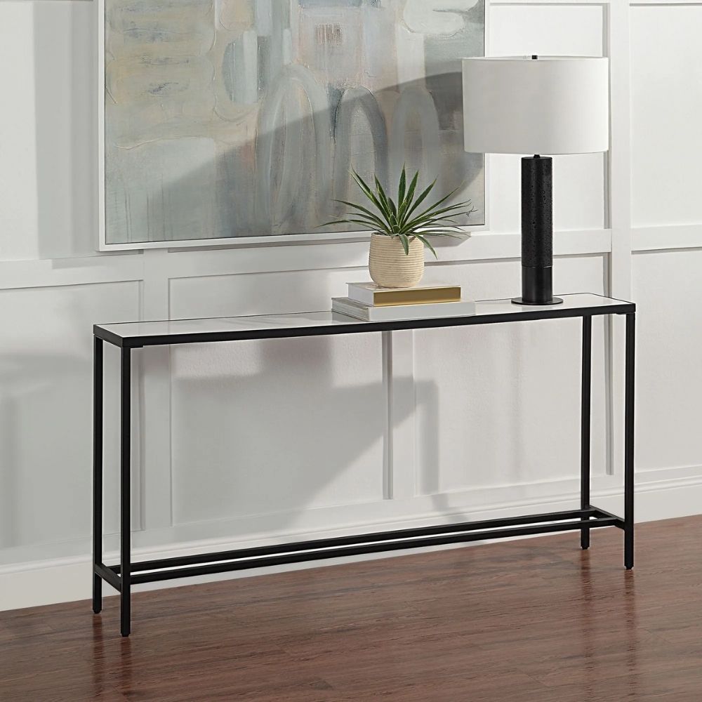 Slim black metal console table with a clean mirrored top and minimalist frame.