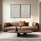 A contemporary diptych artwork featuring geometric block patterns in a neutral, textured palette, framed in sleek black frames against a soft background.