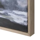 Framed wall art depicting a moody forest landscape in muted tones of green, grey, and white with a reflective water foreground.