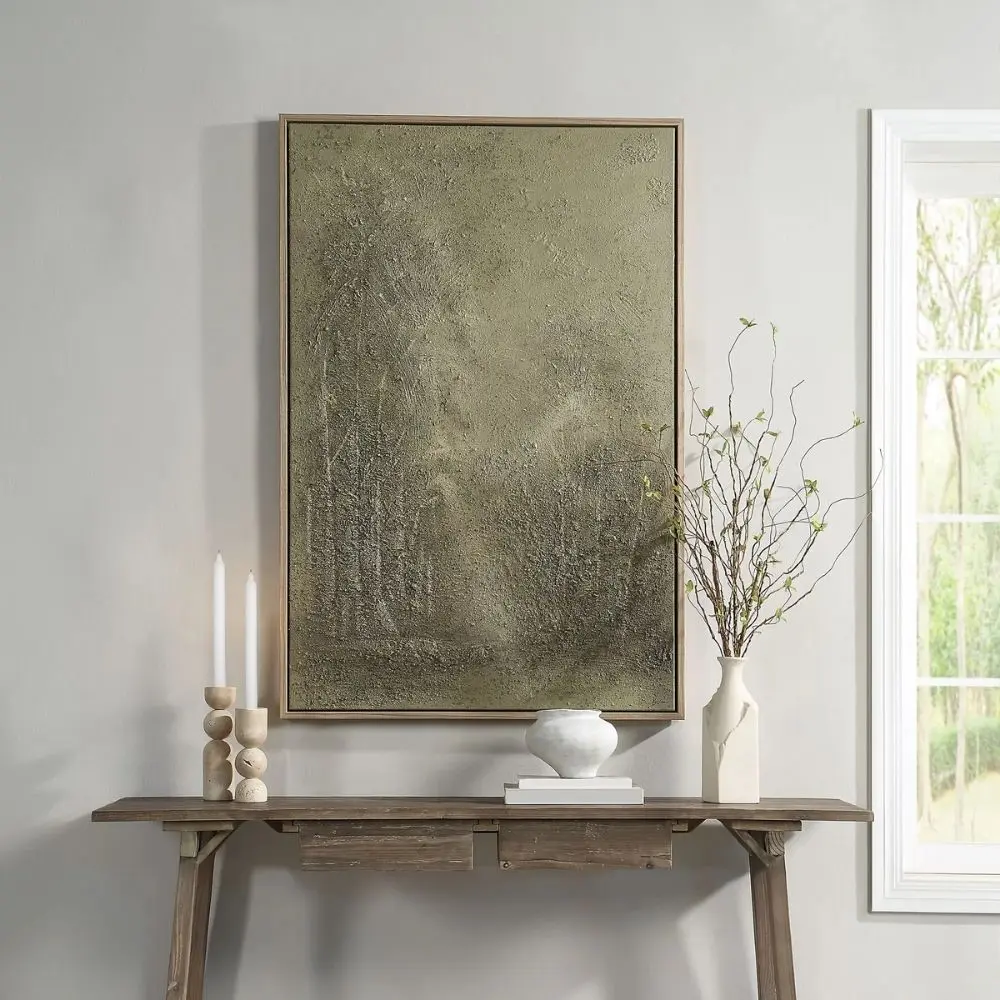 Framed textured canvas artwork depicting a misty forest scene in deep olive and earthy green tones.
