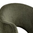 Anaya Dining Armchair in rich forest green velvet with a sculptural arch-back silhouette and solid base design.