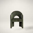 Anaya Dining Armchair in rich forest green velvet with a sculptural arch-back silhouette and solid base design.