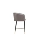 Asher counter stool with upholstered seat and backrest, black tapered legs, and gold foot caps.