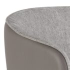 Asher counter stool with upholstered seat and backrest, black tapered legs, and gold foot caps.