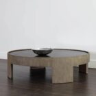 Round coffee table with light wood base and dark recessed top, featuring sculptural curved legs.