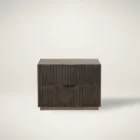 Dark wood nightstand with distinctive vertical fluted drawer fronts and a minimalist rectangular silhouette.