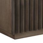 Dark wood nightstand with distinctive vertical fluted drawer fronts and a minimalist rectangular silhouette.
