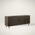 Large dark wood sideboard with vertical fluted front detailing and slim black legs, styled in a minimalist aesthetic.