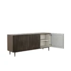 Large dark wood sideboard with vertical fluted front detailing and slim black legs, styled in a minimalist aesthetic.