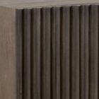 Large dark wood sideboard with vertical fluted front detailing and slim black legs, styled in a minimalist aesthetic.