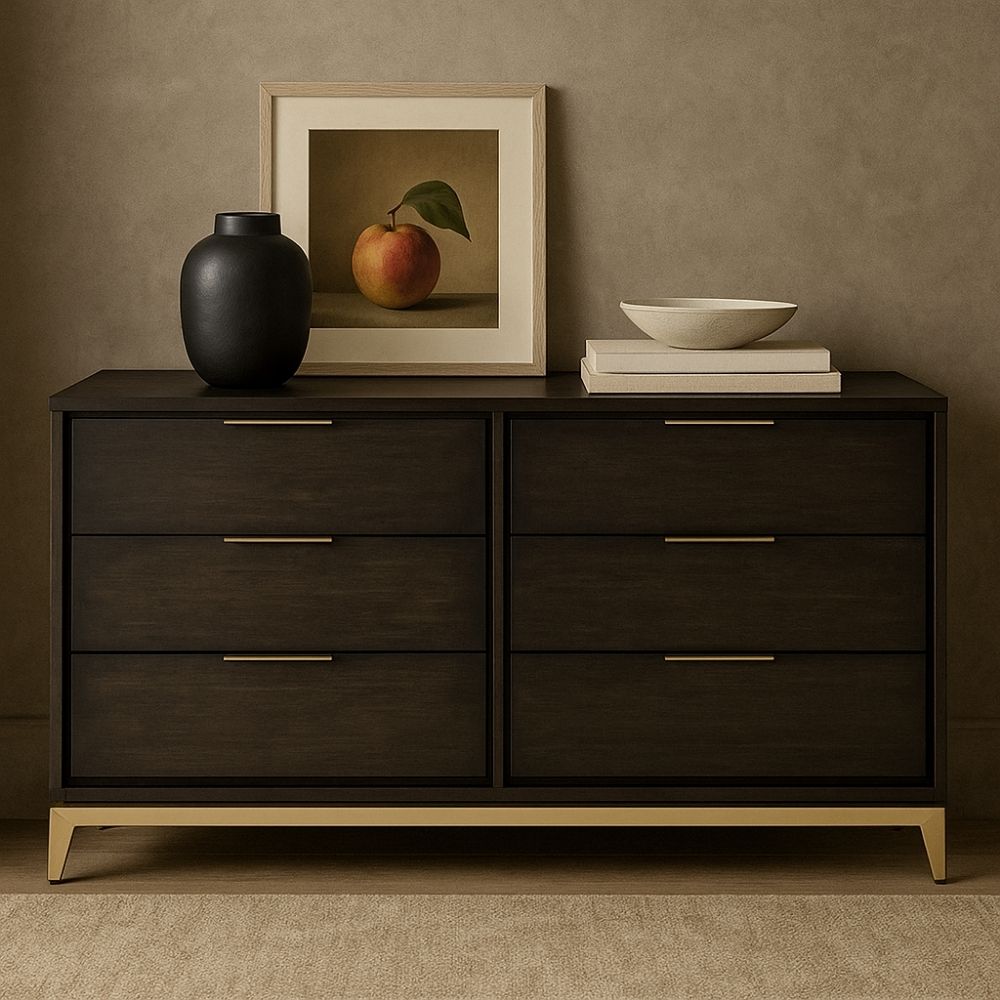 Dark wood dresser with six drawers, slim gold handles, and tapered gold legs.