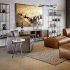 Modern bronze-finished Eiffel bookcase featuring open geometric shelving design.