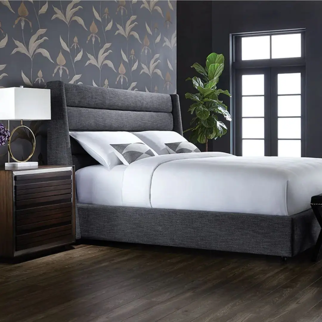 Emmit Bed footboard in dark grey upholstered fabric.