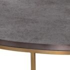 Round coffee table with a textured charcoal top and gold-finished metal base