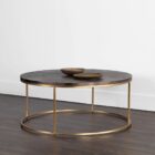 Round coffee table with a textured charcoal top and gold-finished metal base