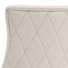 Elegant stool with soft beige upholstered seat and curved gold metal base.