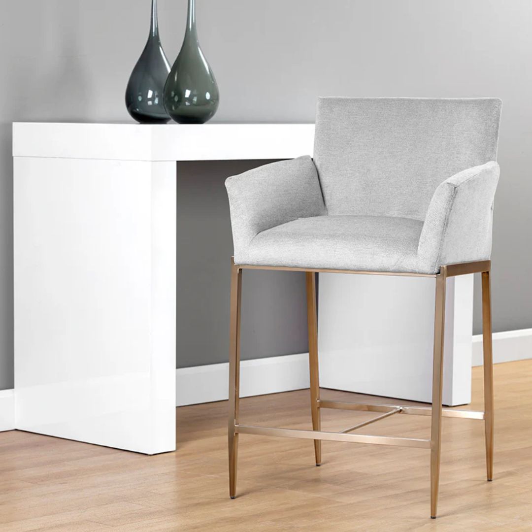 Gesa Stool with grey upholstered seat and gold-finished legs