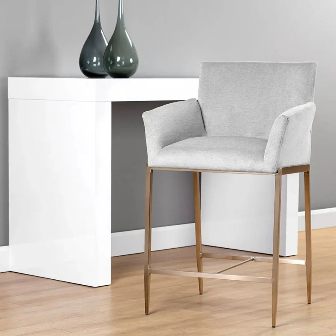 Gesa Stool with grey upholstered seat and gold-finished legs