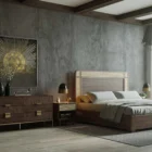 Dark wood dresser with six spacious drawers and elegant metal hardware.