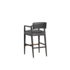 A modern barstool with black wood frame, dark leather upholstery, and a low backrest.