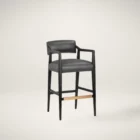 A modern barstool with black wood frame, dark leather upholstery, and a low backrest.