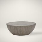 Small round concrete coffee table with a curved bowl-like base and smooth grey finish.