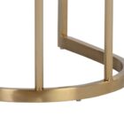 A modern Larissa Stool featuring a warm caramel leather seat, curved white boucle backrest, and slim brushed brass metal frame.