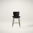 Diamond-stitched black leather seat upholstery, with quilted seat and brass footrest.