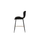 Diamond-stitched black leather seat upholstery, with quilted seat and brass footrest.