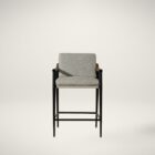 Meadow Counter Stool highlighting the curved backrest, textured upholstery, and sleek black frame with integrated wooden armrests.