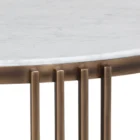 Round marble coffee table with a white stone top, antique brass metal frame, and a smoked glass lower shelf.