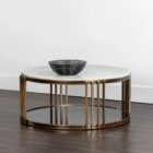 Round marble coffee table with a white stone top, antique brass metal frame, and a smoked glass lower shelf.