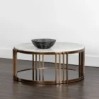 Round marble coffee table with a white stone top, antique brass metal frame, and a smoked glass lower shelf.