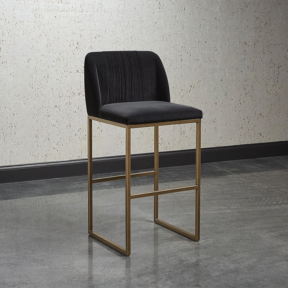 Nevin Counter Stool featuring a black velvet upholstered seat with vertical tufting and a gold-finished metal frame, shown from various angles including front, side, and detail close-ups.