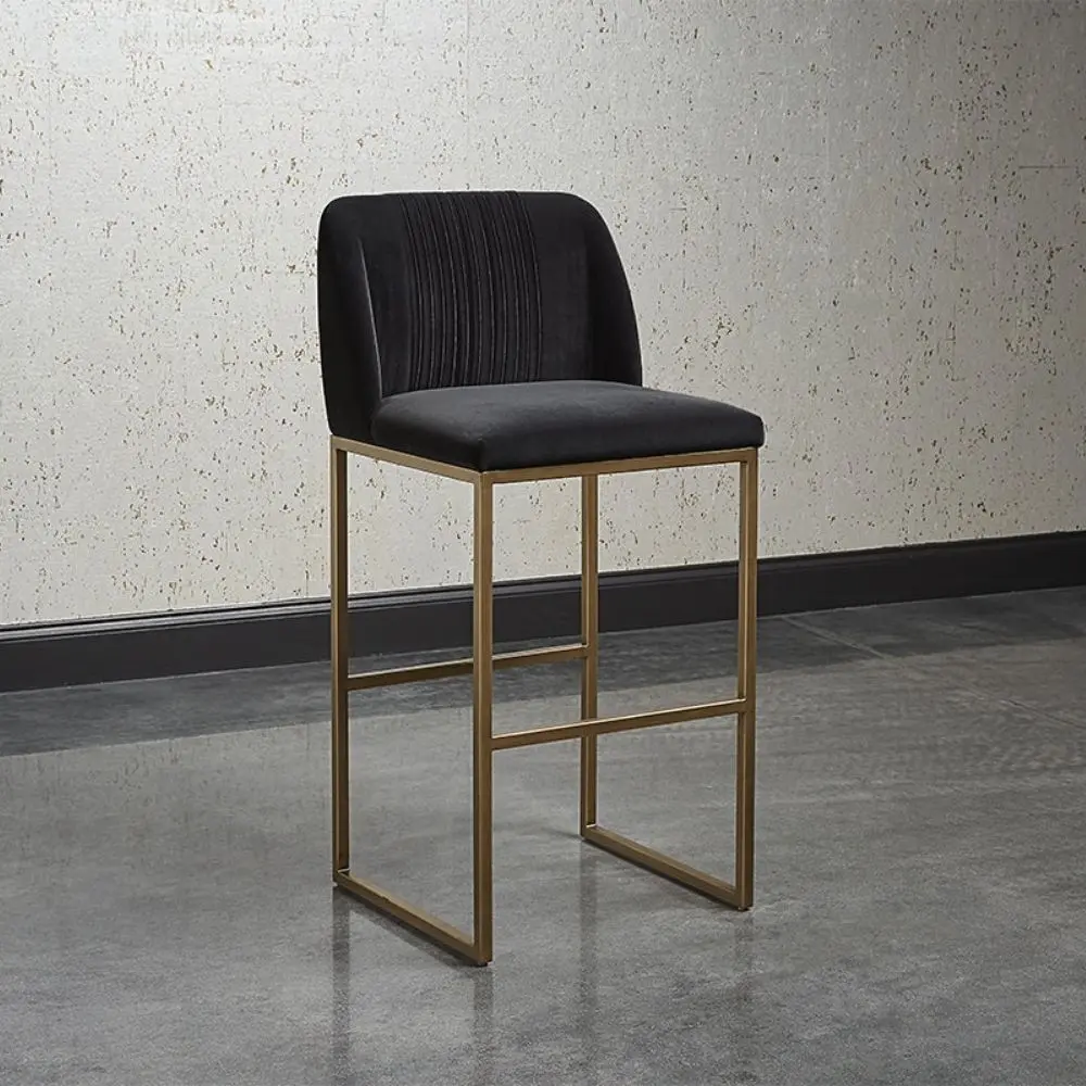 Nevin Counter Stool featuring a black velvet upholstered seat with vertical tufting and a gold-finished metal frame, shown from various angles including front, side, and detail close-ups.