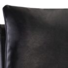 Paige Counter Stool featuring a black faux leather upholstered seat and loose-style back cushion, set on a brushed metal frame with footrest