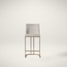 A modern upholstered counter stool with a curved brass-finished metal base and light neutral fabric seat and back.