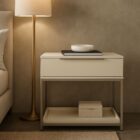 Rebel Nightstand – Large featuring a sleek ivory-toned drawer box, taupe metal frame, and open bottom shelf.