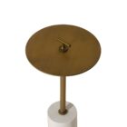 Contemporary end table with a slim brass-finished stem, round brass top with a handle, and white marble cylinder base.