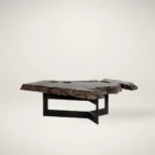 Live-edge wood coffee table with sculptural, raw edges and a black geometric metal base.