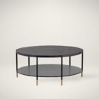 Round black coffee table with slim metal frame, lower glass shelf, and gold-dipped leg tips.