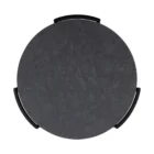 Round modern end table with black textured top, slim black legs, lower shelf, and brass-capped feet.