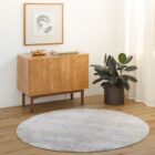 Brunswick Machine Woven Rug in soft greys, creams, and beige tones with a distressed abstract pattern.