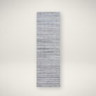 Close-up of Hollister Handmade Rug showing textured linear pattern in neutral tones.