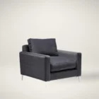 Charcoal velvet accent chair with structured arms, loose back cushion, and slender polished chrome legs.