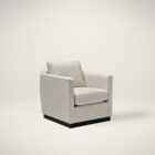 Modern ivory swivel chair with boxy arms, plush cushions, and a sleek black plinth base