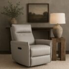 Contemporary taupe leather recliner with sleek lines, high backrest, and side-mounted power control.