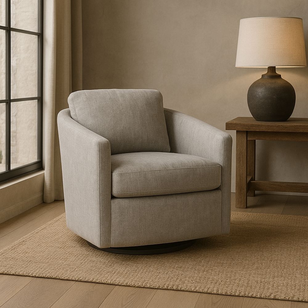 Modern light grey upholstered swivel chair with angled arms and a rounded base.